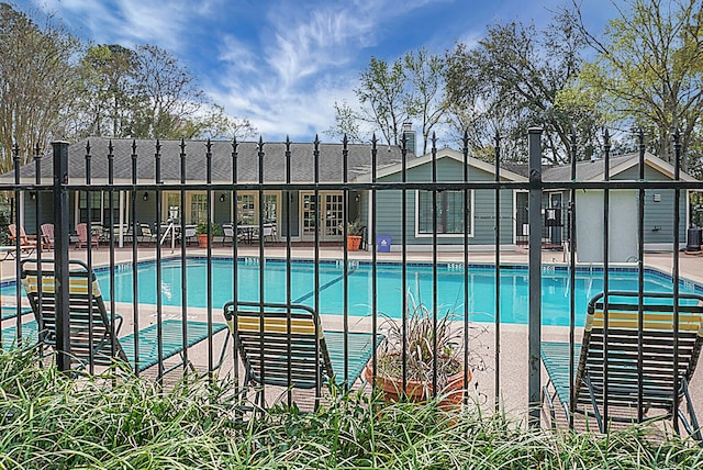 view of pool featuring a patio area