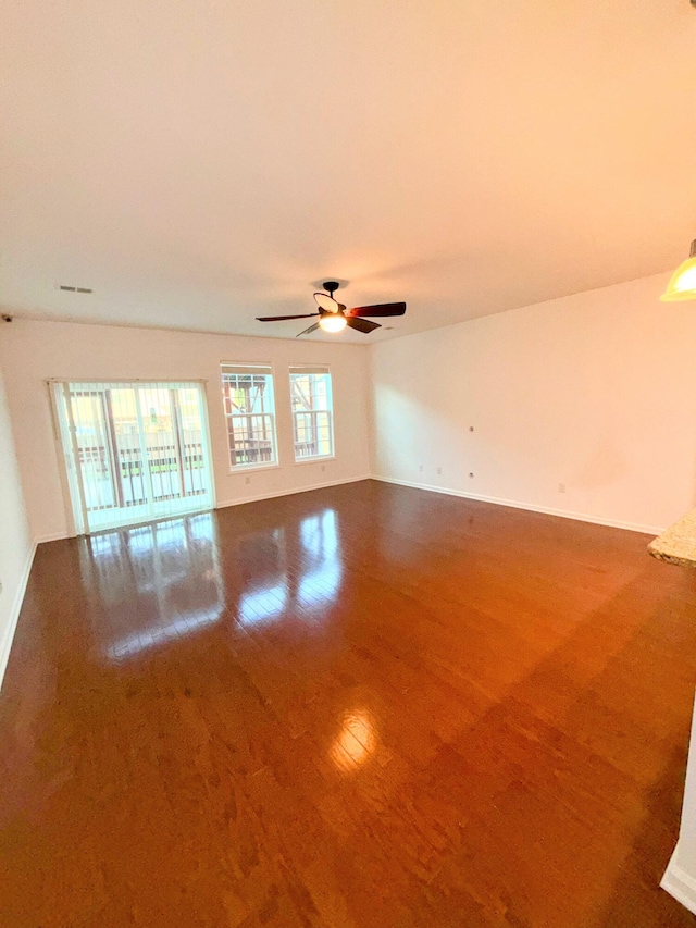 332 Southern Sugar Ave, Moncks Corner, SC 29461 - spare room with wood finished floors, ceiling fan, and baseboards