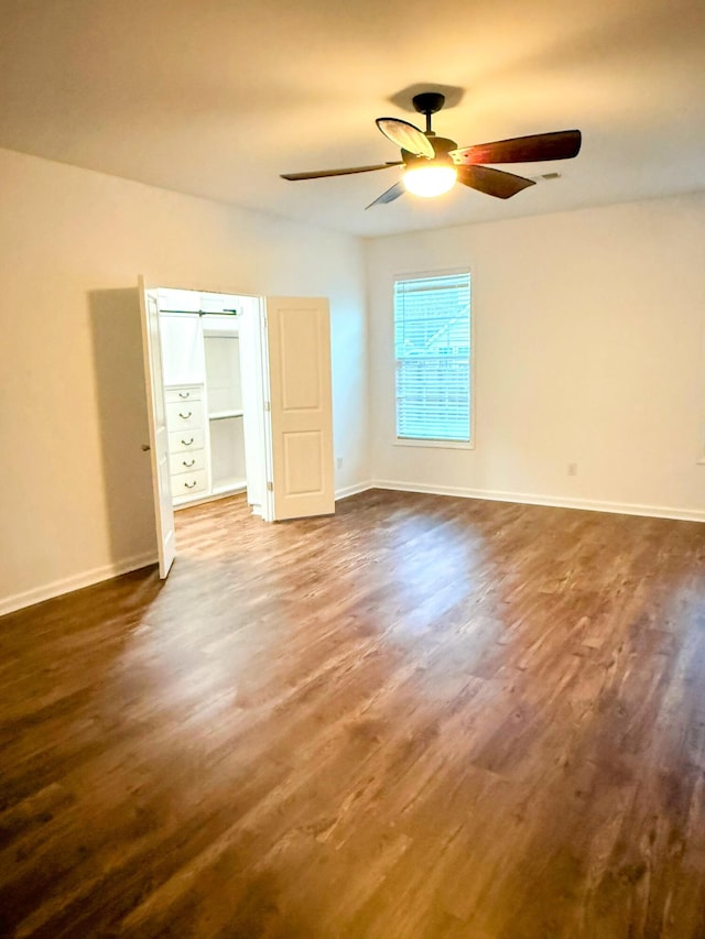 332 Southern Sugar Ave, Moncks Corner, SC 29461 - spare room with dark wood finished floors, a ceiling fan, and baseboards