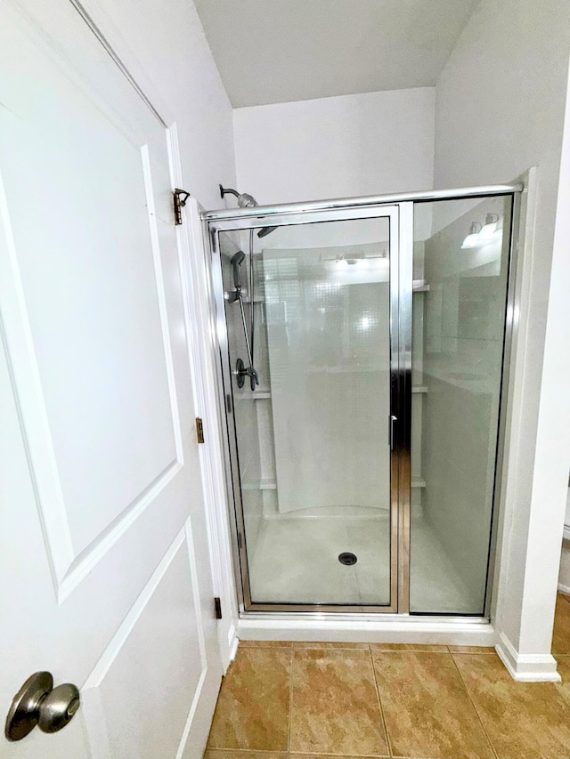 332 Southern Sugar Ave, Moncks Corner, SC 29461 - bathroom featuring a shower stall and tile patterned floors