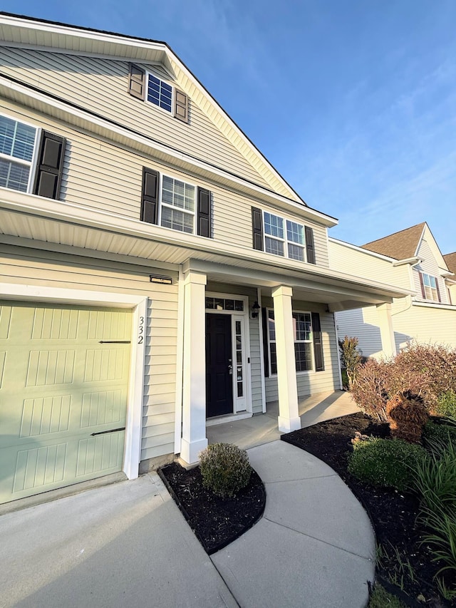 332 Southern Sugar Ave, Moncks Corner, SC 29461 - view of front facade featuring a porch and a garage