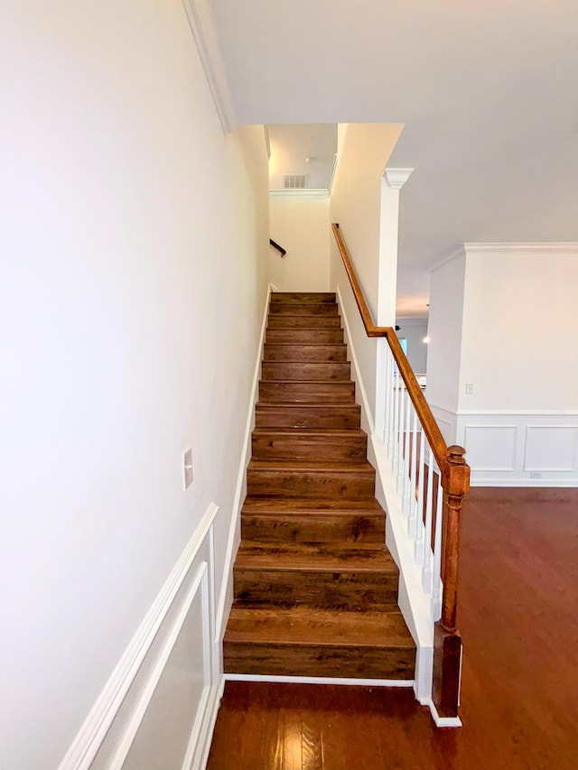 332 Southern Sugar Ave, Moncks Corner, SC 29461 - stairs with ornamental molding and a wainscoted wall