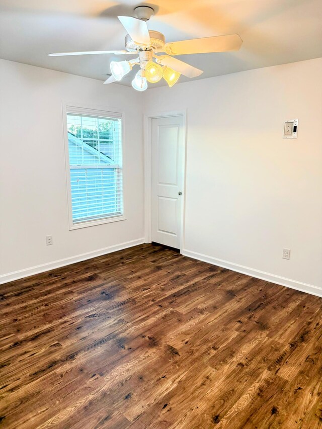 332 Southern Sugar Ave, Moncks Corner, SC 29461 - spare room featuring dark wood-type flooring, ceiling fan, and baseboards