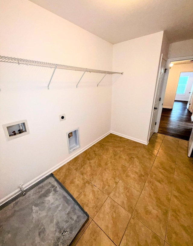 332 Southern Sugar Ave, Moncks Corner, SC 29461 - laundry area featuring hookup for a washing machine, tile patterned floors, electric dryer hookup, and baseboards