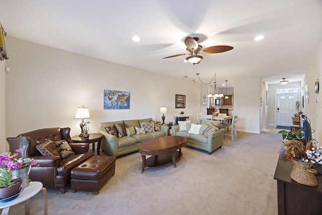 living room with ceiling fan and light carpet