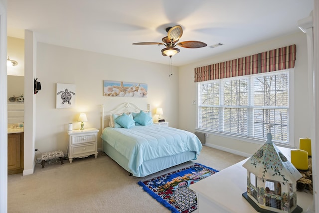 carpeted bedroom with ceiling fan