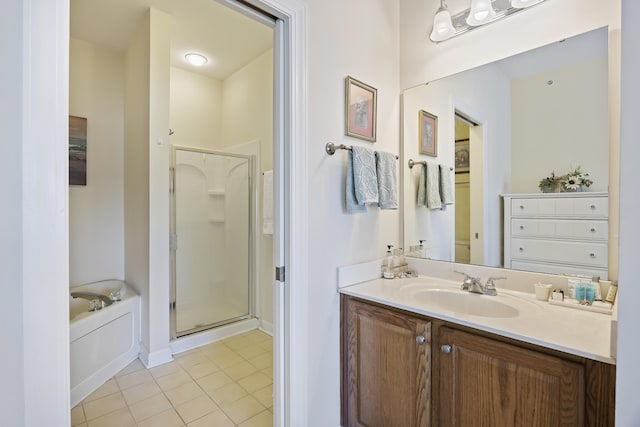 bathroom with tile patterned floors, vanity, and plus walk in shower