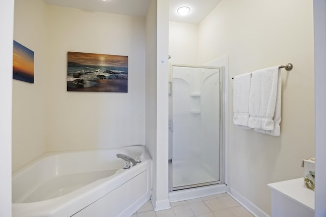 bathroom featuring plus walk in shower and tile patterned flooring