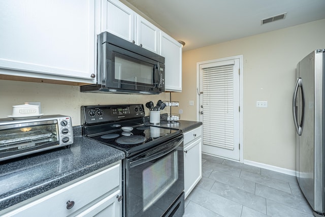 kitchen with a toaster, visible vents, white cabinetry, black appliances, and dark countertops