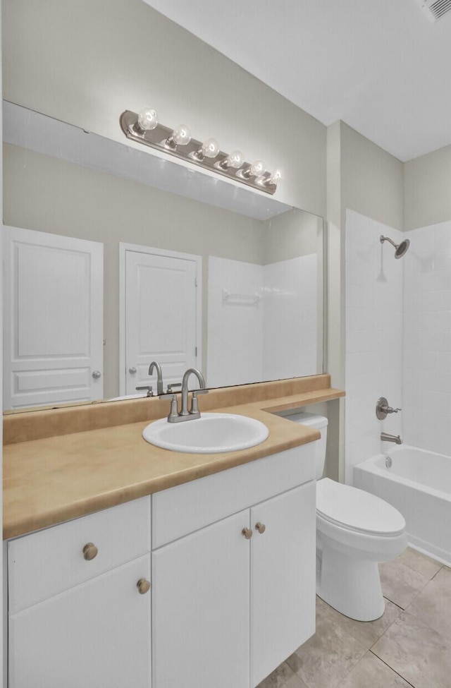 full bathroom featuring tile patterned floors, vanity,  shower combination, and toilet