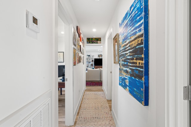 hallway featuring light hardwood / wood-style flooring