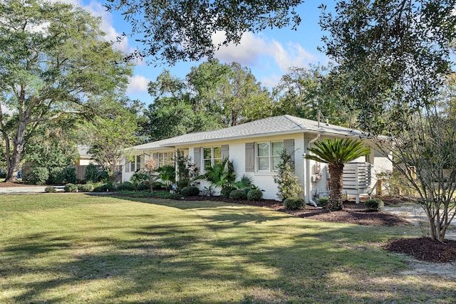 single story home with a front yard