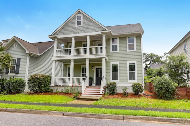 5242 E Dolphin St, North Charleston, SC 29405 - view of front facade with a balcony and a porch