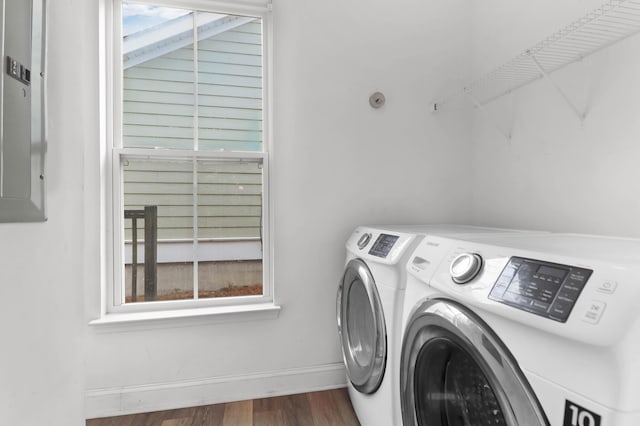 5242 E Dolphin St, North Charleston, SC 29405 - washroom with washing machine and clothes dryer and wood finished floors