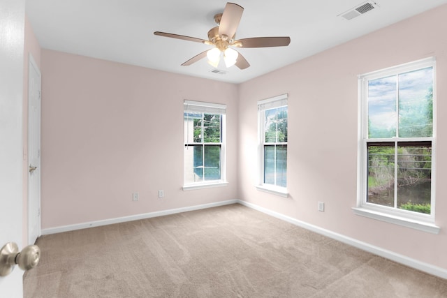 5242 E Dolphin St, North Charleston, SC 29405 - spare room featuring carpet flooring and a ceiling fan