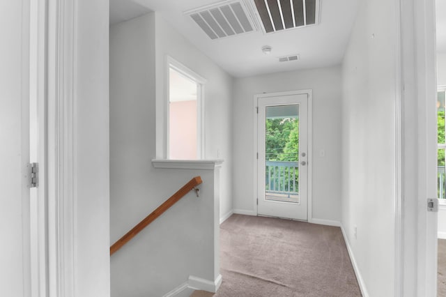 5242 E Dolphin St, North Charleston, SC 29405 - doorway to outside with carpet floors and baseboards