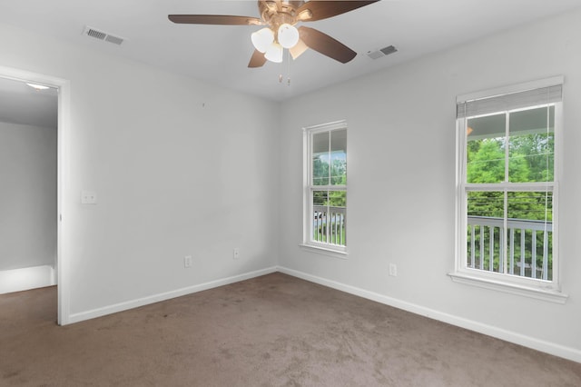 5242 E Dolphin St, North Charleston, SC 29405 - carpeted empty room with ceiling fan and baseboards