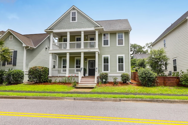 5242 E Dolphin St, North Charleston, SC 29405 - view of front of house featuring a balcony and covered porch