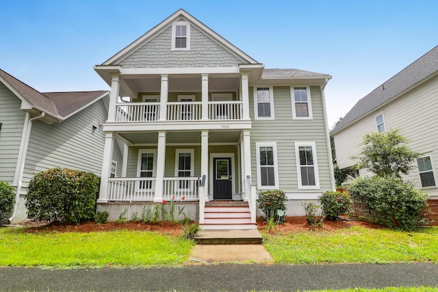 5242 E Dolphin St, North Charleston, SC 29405 - view of front facade with a balcony and a porch
