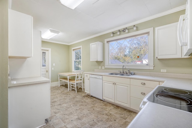 kitchen featuring white appliances, sink, crown molding, and white cabinets