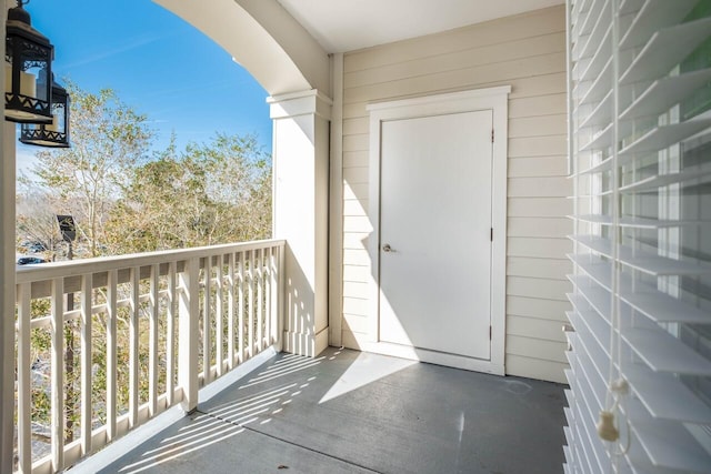 doorway to property featuring a balcony