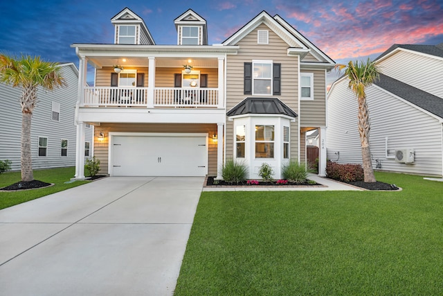 204 Honey Horn Dr, Summerville, SC 29486 - view of front facade with a standing seam roof, a lawn, metal roof, an attached garage, and concrete driveway