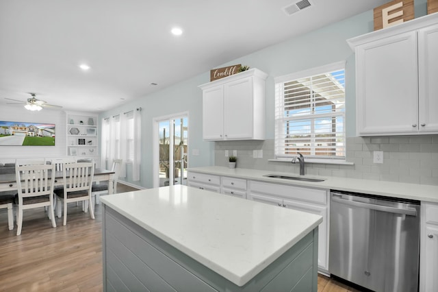 204 Honey Horn Dr, Summerville, SC 29486 - kitchen with light countertops, a ceiling fan, visible vents, dishwasher, and a sink