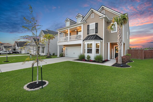204 Honey Horn Dr, Summerville, SC 29486 - view of front of property with driveway, a balcony, an attached garage, and a front lawn