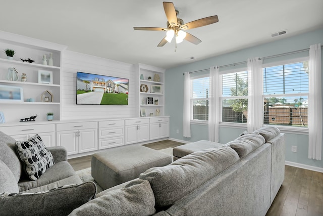 204 Honey Horn Dr, Summerville, SC 29486 - living room with light wood-style floors, baseboards, a ceiling fan, and visible vents