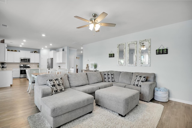204 Honey Horn Dr, Summerville, SC 29486 - living room featuring recessed lighting, light wood-style floors, baseboards, and ceiling fan