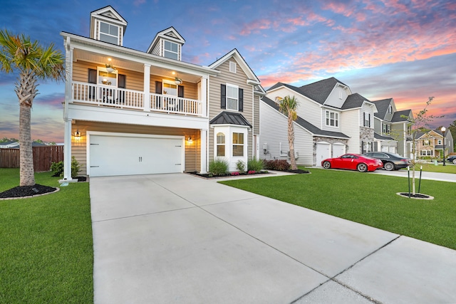 204 Honey Horn Dr, Summerville, SC 29486 - view of front of home with concrete driveway, a front yard, fence, and a garage