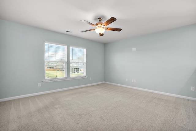 204 Honey Horn Dr, Summerville, SC 29486 - empty room featuring carpet flooring, visible vents, baseboards, and a ceiling fan