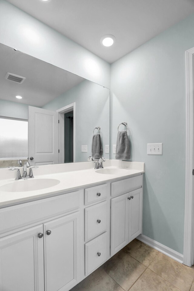 204 Honey Horn Dr, Summerville, SC 29486 - full bathroom with double vanity, visible vents, and a sink