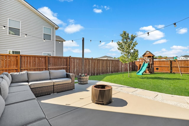 204 Honey Horn Dr, Summerville, SC 29486 - view of patio with an outdoor living space with a fire pit, a fenced backyard, and a playground