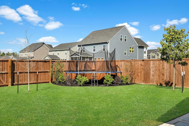 204 Honey Horn Dr, Summerville, SC 29486 - view of yard featuring a trampoline, a residential view, and a fenced backyard