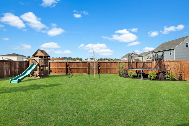 204 Honey Horn Dr, Summerville, SC 29486 - view of yard with a trampoline, a fenced backyard, and a playground