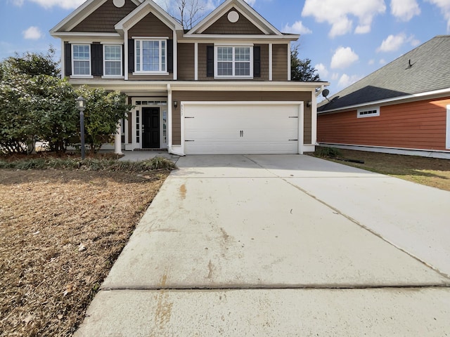 view of front of property featuring a garage