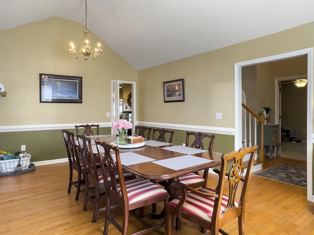 5505 Indigo Makers Trce, Charleston, SC 29418 - dining room with stairs, lofted ceiling, light wood-style floors, baseboards, and a notable chandelier