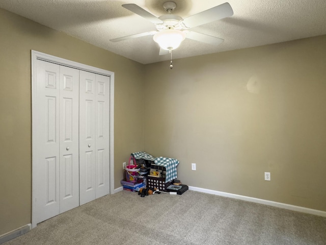 5505 Indigo Makers Trce, Charleston, SC 29418 - unfurnished bedroom with carpet floors, a ceiling fan, a textured ceiling, and baseboards