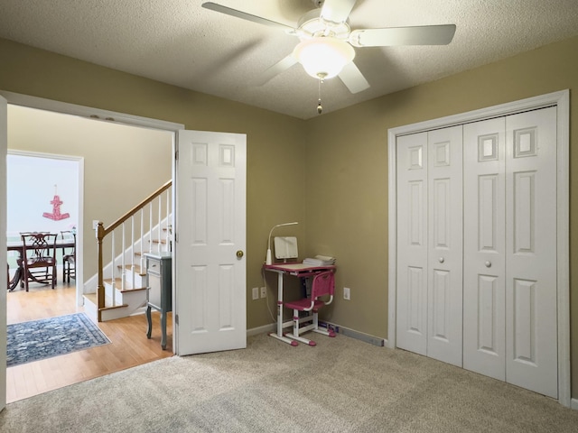 5505 Indigo Makers Trce, Charleston, SC 29418 - recreation room with carpet flooring, a textured ceiling, ceiling fan, and baseboards