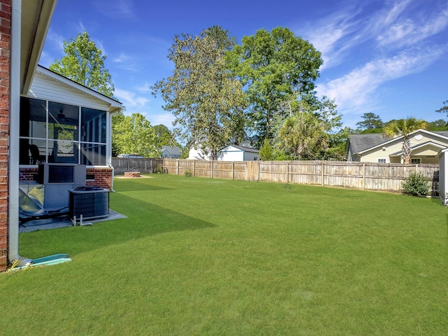 5505 Indigo Makers Trce, Charleston, SC 29418 - view of yard with a fenced backyard, central AC unit, and a sunroom