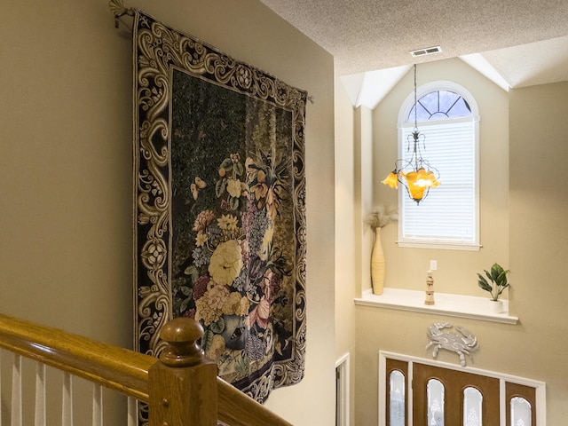 5505 Indigo Makers Trce, Charleston, SC 29418 - interior details featuring visible vents, a textured ceiling, and an inviting chandelier