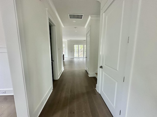 hallway with dark wood-type flooring