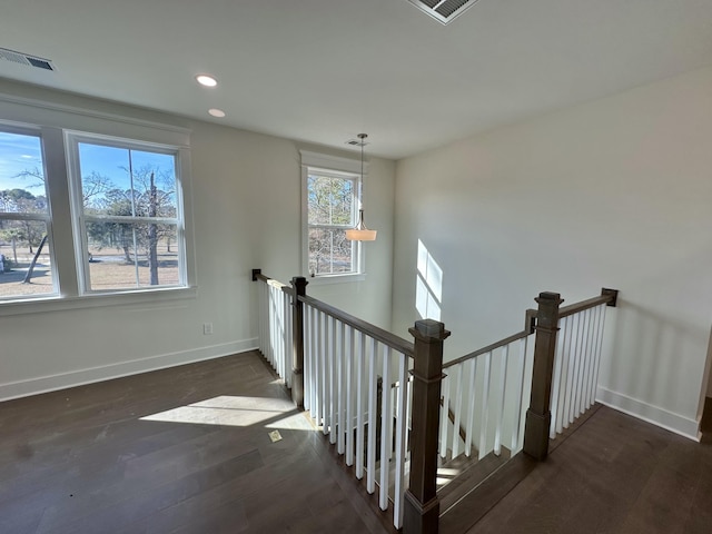 stairway with wood-type flooring