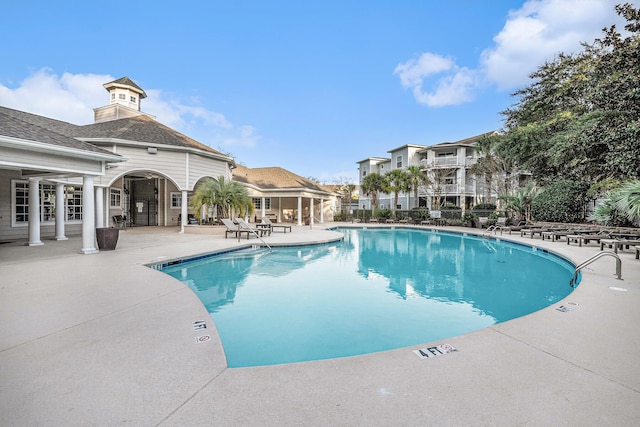 view of pool featuring a patio area