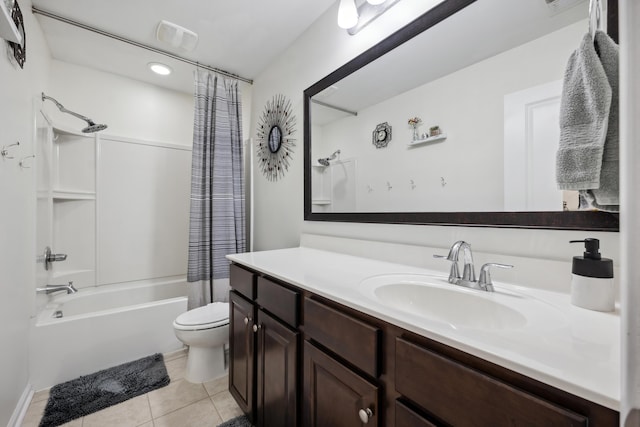 full bathroom featuring tile patterned flooring, toilet, shower / bathtub combination with curtain, and vanity