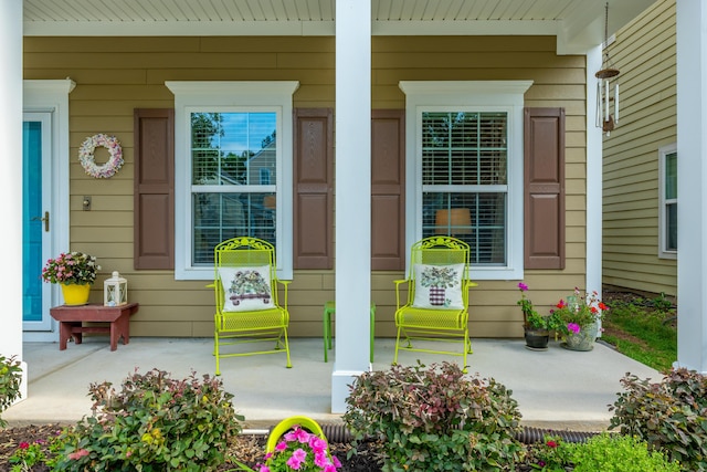 doorway to property featuring covered porch