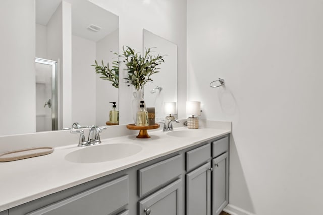 9712 Fanning Basket Ln, Ladson, SC 29456 - bathroom with double vanity and a shower with door