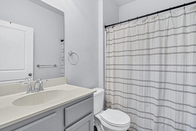 9712 Fanning Basket Ln, Ladson, SC 29456 - bathroom featuring toilet, vanity, and a shower with curtain