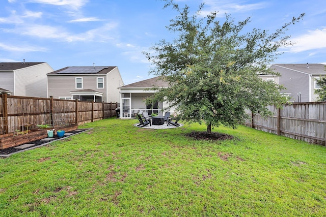 9712 Fanning Basket Ln, Ladson, SC 29456 - view of yard with a sunroom and a fire pit